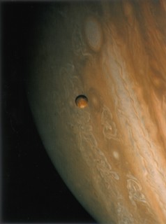 Jupiter and Io, one of its moons, 1979. Artist: Unknown