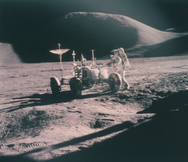 Apollo 15 astronaut James Irwin with the Lunar Rover, August 1971. Artist: Unknown