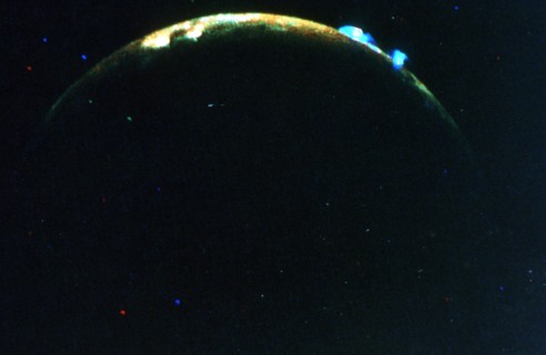Volcanic eruption on Jupiter's moon, lo, 1979. Artist: Unknown