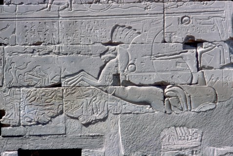 Detail of relief of Pharaoh in chariot riding down his enemies, Temple of Amun, Karnak, c1400 BC. Artist: Unknown