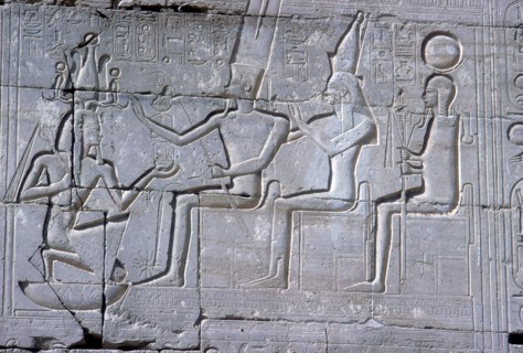 Relief of Rameses II kneeling before Amun Mut & Khons, The Ramesseum, Luxor, Egypt, c1250 BC. Artist: Unknown