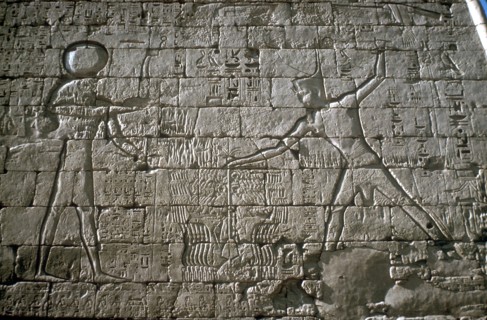 Rameses III smiting his enemies before Amun-Ra, Mortuary Temple, Medinat Habu, Egypt, c12th cen BC. Artist: Unknown