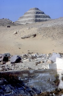 Step Pyramid of King Djoser (Zozer) behind ruins of temple, Saqqara, Egypt, c2600 BC. Artist: Imhotep