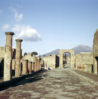 Road leading to Arch of Caligula with Vesuvius beyond, Pompeii, Italy. Creator: Unknown.