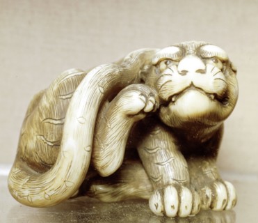 Netsuke carved in the form of a tiger, one of the 12 animals of the Japanese zodiac. Artist: Unknown