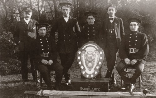 Members of the winning Rowntree Ambulance Team pose with trophy, York, Yorkshire, 24 Jan 1914. Artist: Unknown