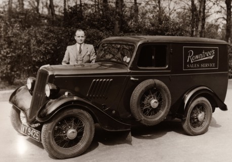 A Rowntree?s sales representative besides his car, York, Yorkshire,  1937. Artist: Unknown