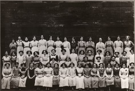 Group photo of women and girl workers at Mackintosh, Halifax, West Yorkshire, 1912. Artist: Unknown