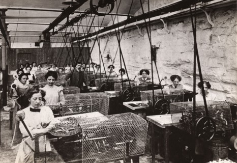 Toffee wrapping machines, Mackintosh factory, Halifax, West Yorkshire, 1912. Artist: Unknown