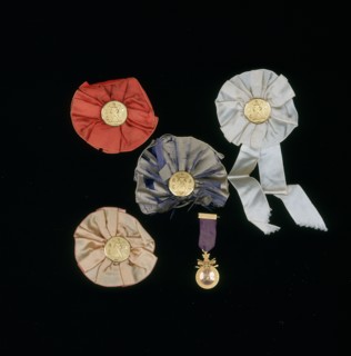 Rosette badges given by Harold W Pierce with Royal and Ancient Golf Club buttons in rosette badges Artist: Unknown