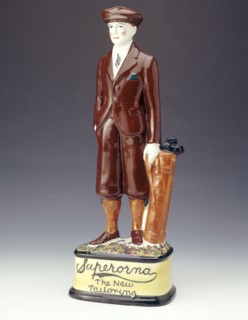 Pottery figure of a golfer advertising Superorna tailoring, 1920s. Artist: Unknown