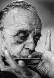 Larry Adler (1914-2001), Musician, playing his harmonica, 1992. Artist: Unknown