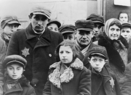 Jews wearing Star of David badges, Lodz Ghetto, Poland, 1940-1944. Artist: Unknown
