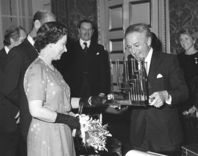 Greville Janner presents the Queen with a menorah, December 1982. Artist: Sidney Harris