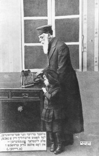 Lighting the Chanukah menorah, 1910. Artist: Unknown