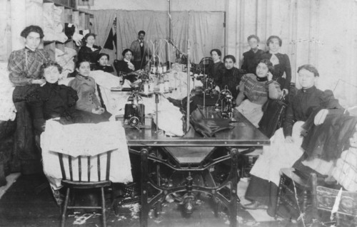 Tailoring workshop, East End of London, c1900. Artist: Unknown