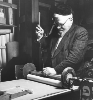 Sewing together completed sections of a Sefer Torah, 1974. Artist: Unknown