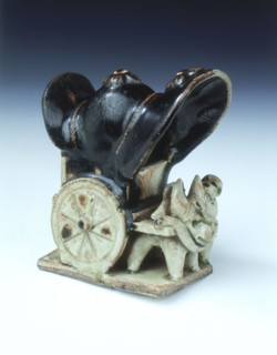 Ox-drawn covered wagon with lady passenger, late Tang dynasty, China, 9th century. Artist: Unknown
