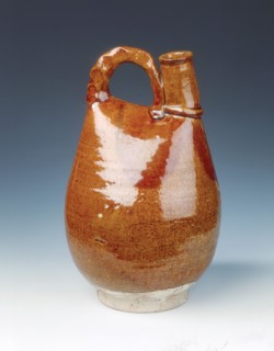 Brown glazed bottle of leather bag shape, Liao dynasty, China, 11th century. Artist: Unknown