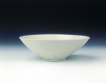 White ware bowl with moulded twin fish and floral pattern, Jin dynasty, China, 12th century. Artist: Unknown