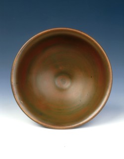 Yaozhou stoneware tea bowl with persimmon red glaze, Jin dynasty, China, 12th century. Artist: Unknown