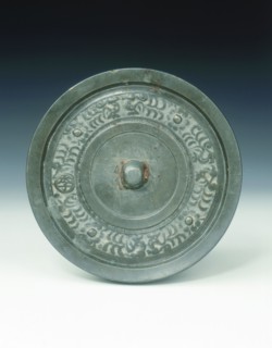 Bronze mirror with multi-armed Avalokitesvara and characters, Yuan dynasty, China, 1271-1368. Artist: Unknown