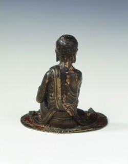 Gilt bronze statue of a lohan seated on a rush mat, late Ming dynasty, China, 1600-1644. Artist: Unknown