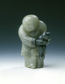 Jade chubby boy holding a black cat, early Ming dynasty or earlier, China, c1300-1550. Artist: Unknown