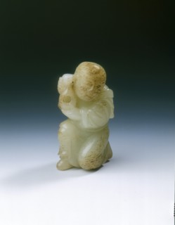 Yellowish jade kneeling tribute bearer, Tang or Liao dynasty, China, 8th-11th century. Artist: Unknown