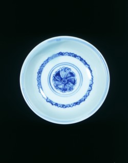 Blue and white 'hole in the bottom' bowl with hibiscus scroll, Ming dynasty, China, 15th century. Artist: Unknown