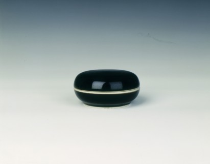 Mirror black covered seal paste box, Qing dynasty, late Kangxi period, China, 1700-1722. Artist: Unknown