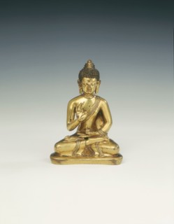 Gilt brass Amoghasiddhi, Buddha of infallible magic, Mongolia, 18th century. Artist: Unknown