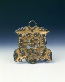 Gilt bronze horse fitting with archer on horseback, Tang dynasty, China, 8th century. Artist: Unknown