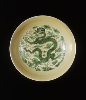 Saucer with green dragon on cafe au lait ground, Yongzheng period, Qing dynasty, China, 1723-1735. Artist: Unknown