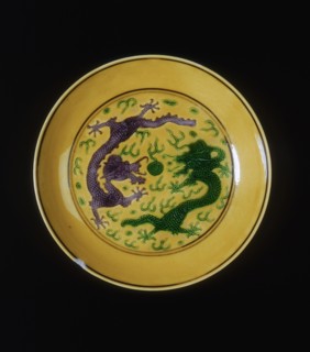Green and aubergine dragon saucer, Guangxu period, Qing dynasty, China, 1875-1908. Artist: Unknown