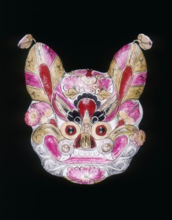 A tiger face mask painted with garish colours, China, 20th century. Artist: Unknown