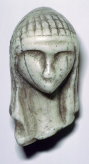 Paleolithic ivory female head. Artist: Unknown