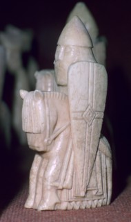 A Knight - The Lewis Chessmen, (Norwegian?), c1150-c1200. Artist: Unknown