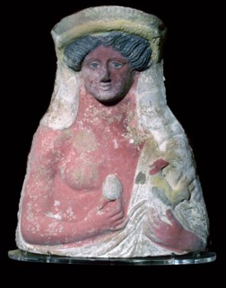 Terracotta bust of Dionysus with common offerings at tombs. Artist: Unknown