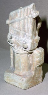 Roman terracotta lamp in the shape of a water-organ. Artist: Unknown