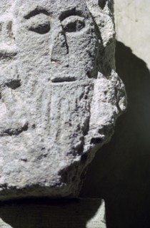 Detail of a stone head in Penmon Priory. Artist: Unknown