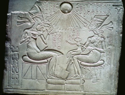 Egyptian relief of Akhenaten and Nefertiti holding their daughters, 14th century BC. Artist: Unknown