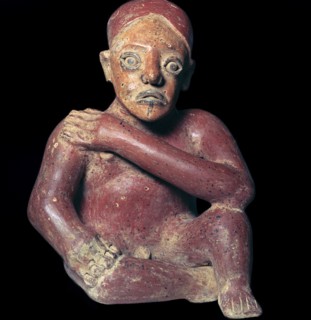 Mexican pottery figure of a squatting man, 4th century. Artist: Unknown