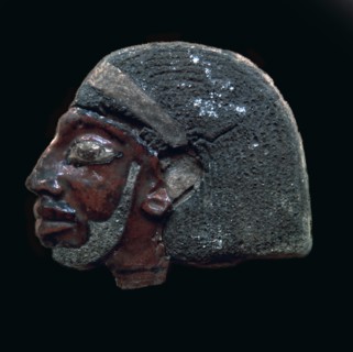 Egyptian glazed relief of a Nubian slave. Artist: Unknown