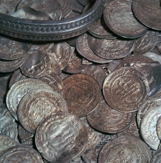 Hoard of silver with arab coins from a Viking grave. Artist: Unknown