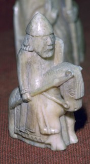 A Knight - The Lewis Chessmen, (Norwegian?), c1150-c1200. Artist: Unknown