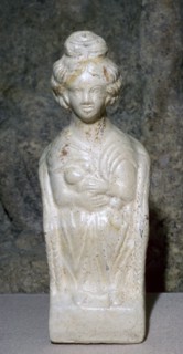 Ceramic figurine of a Mother Goddess, sitting in a chair and nursing a baby, 2nd century. Artist: Unknown