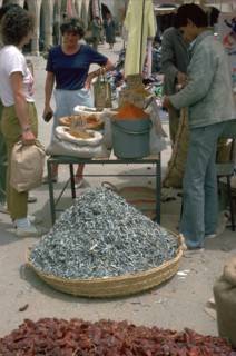 Selling spices and fish in Gabes market. Artist: Unknown
