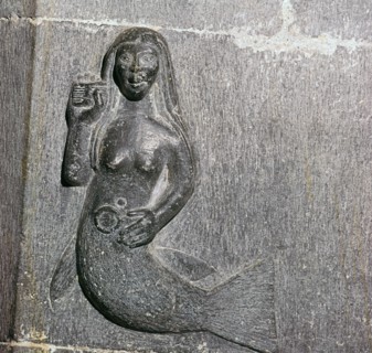 Mermaid on the chancel arch of Clonfert Cathedral, 12th century. Artist: Unknown