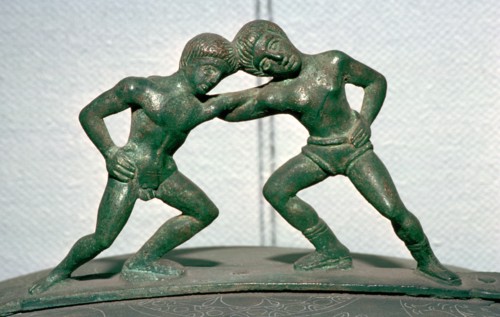 Etruscan bronze handle of a cista, showing Peleus and Thetis wrestling. Artist: Unknown